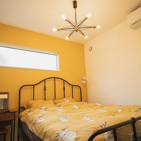 Orange County Guest House Ідзумі-Сано Номер фото